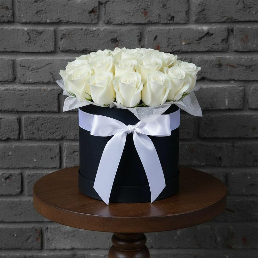 Цветочная композиция из Розы в шляпной коробке в Богдановиче Свердловская область